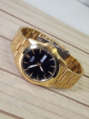 Citizen Quartz Gold-Tone Bracelet Watch with Black Dial